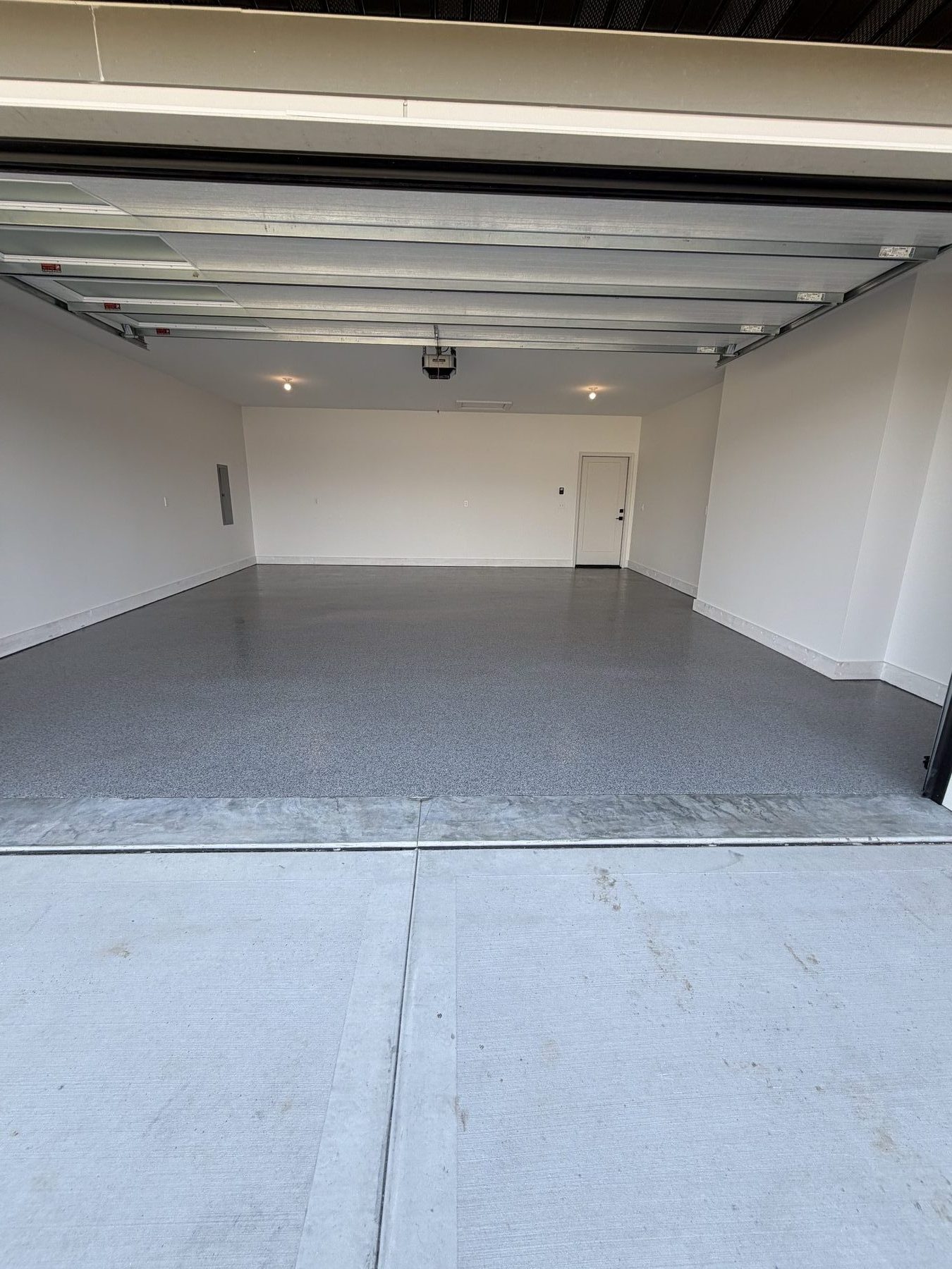 Full flake epoxy garage floor by Elite Coatings — Edwardsville, IL
